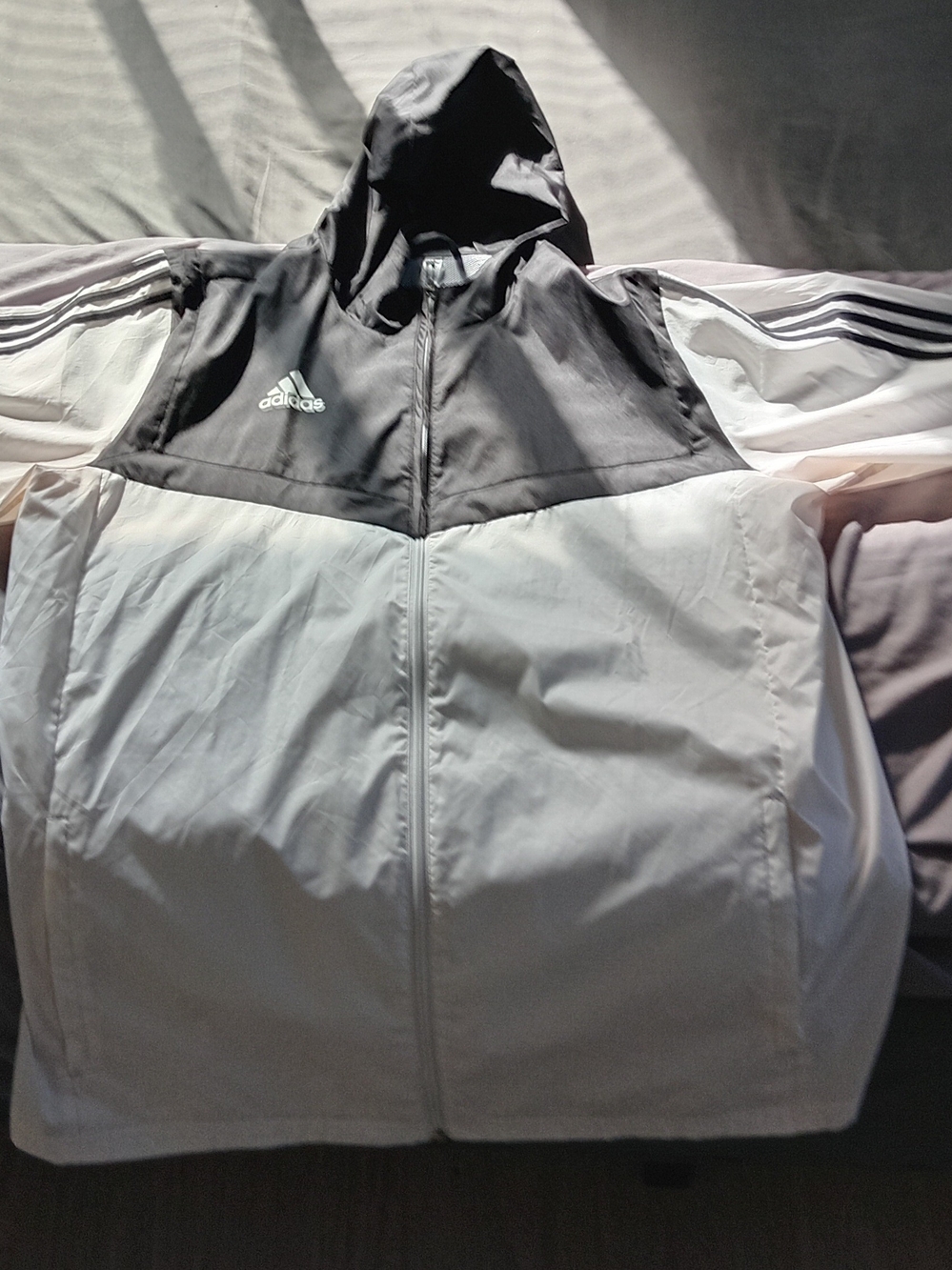 adidas Hooded Windbreaker Jacket in Black and White with Three-Stripe Sleeves